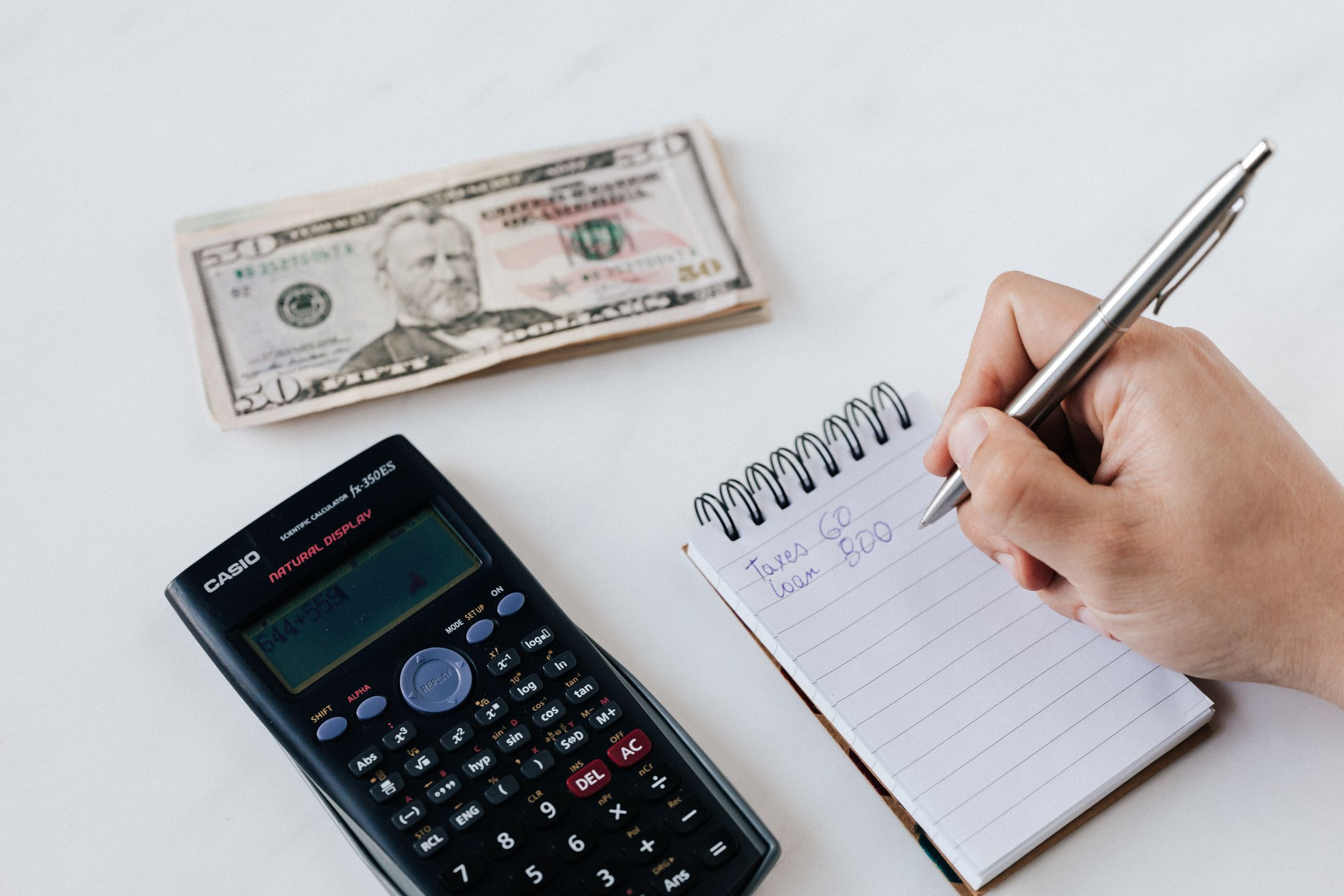 Stressed business owner dealing with tax forms