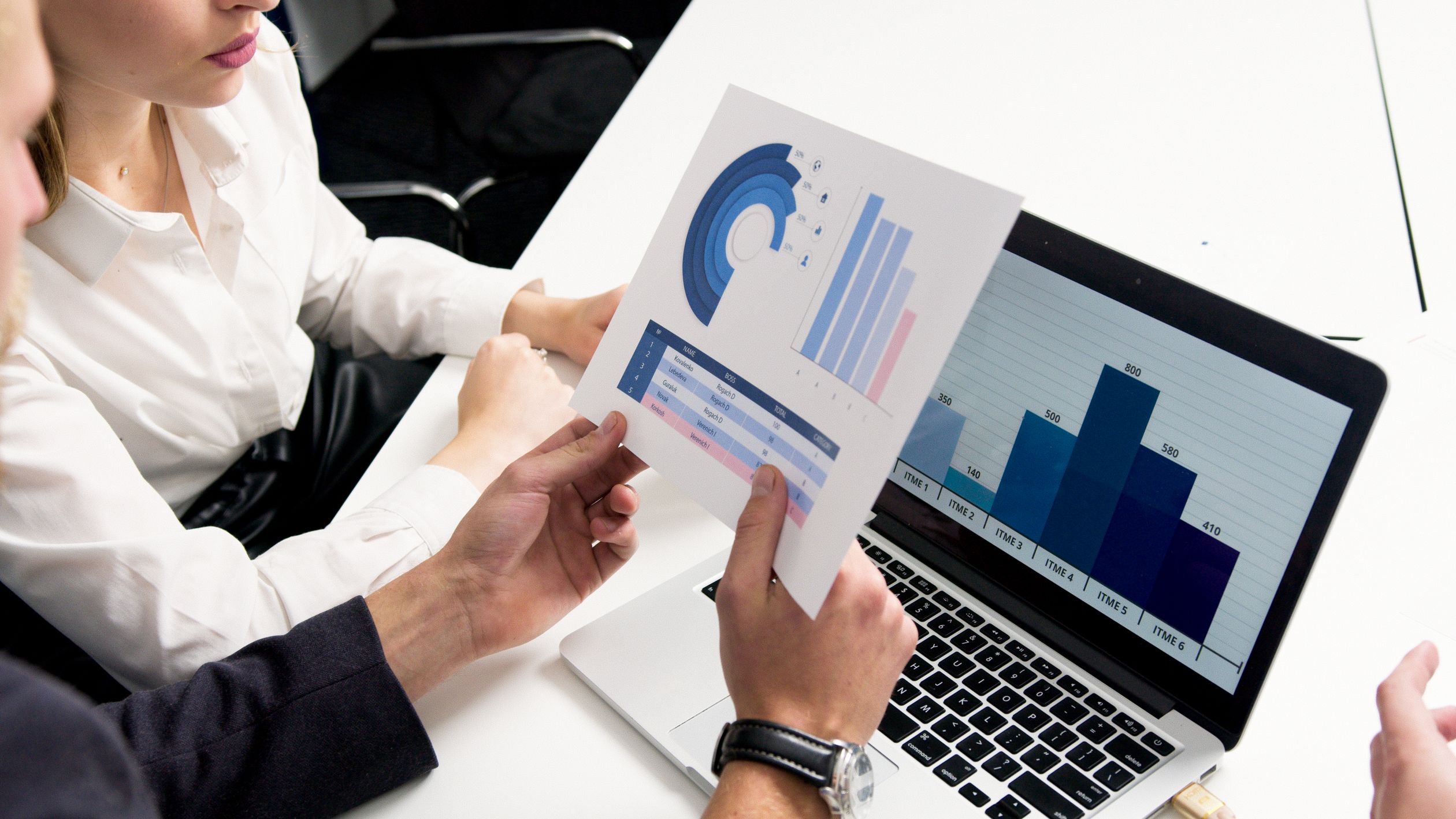 Relaxed business owner reviewing reports